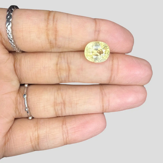Buy Authentic Natural Yellow Sapphire Gemstone In Oval Shape 5.18 Carats 10.45x8.94x6.59mm Size
