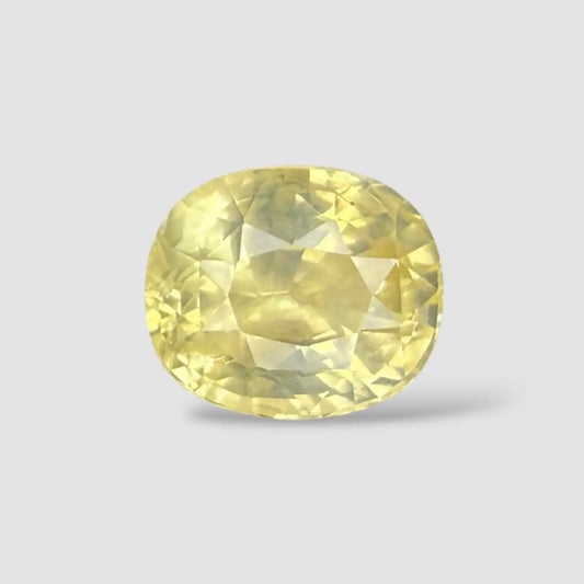 Buy Authentic Natural Yellow Sapphire Gemstone In Oval Shape 5.18 Carats 10.45x8.94x6.59mm Size