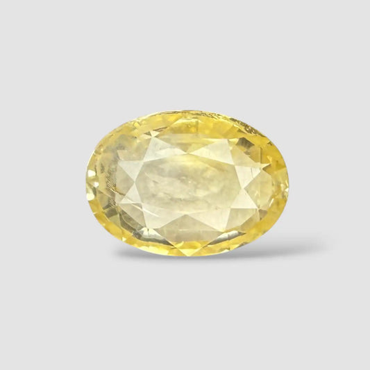 Buy premium natural Yellow Sapphire Gemstone In Oval Shape 5.39 Carats 11.23x8.05x5.61mm Size
