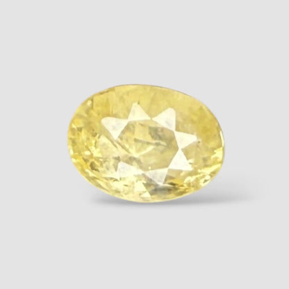 Natural Yellow Sapphire Stone In Oval Shape 5.61 Carats 11.61x8.55x 6.79mm Size