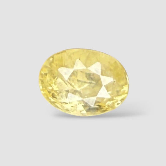 Natural Yellow Sapphire Stone In Oval Shape 5.61 Carats 11.61x8.55x 6.79mm Size