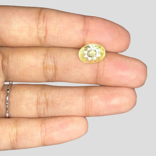 Natural Yellow Sapphire Stone In Oval Shape 5.61 Carats 11.61x8.55x 6.79mm Size