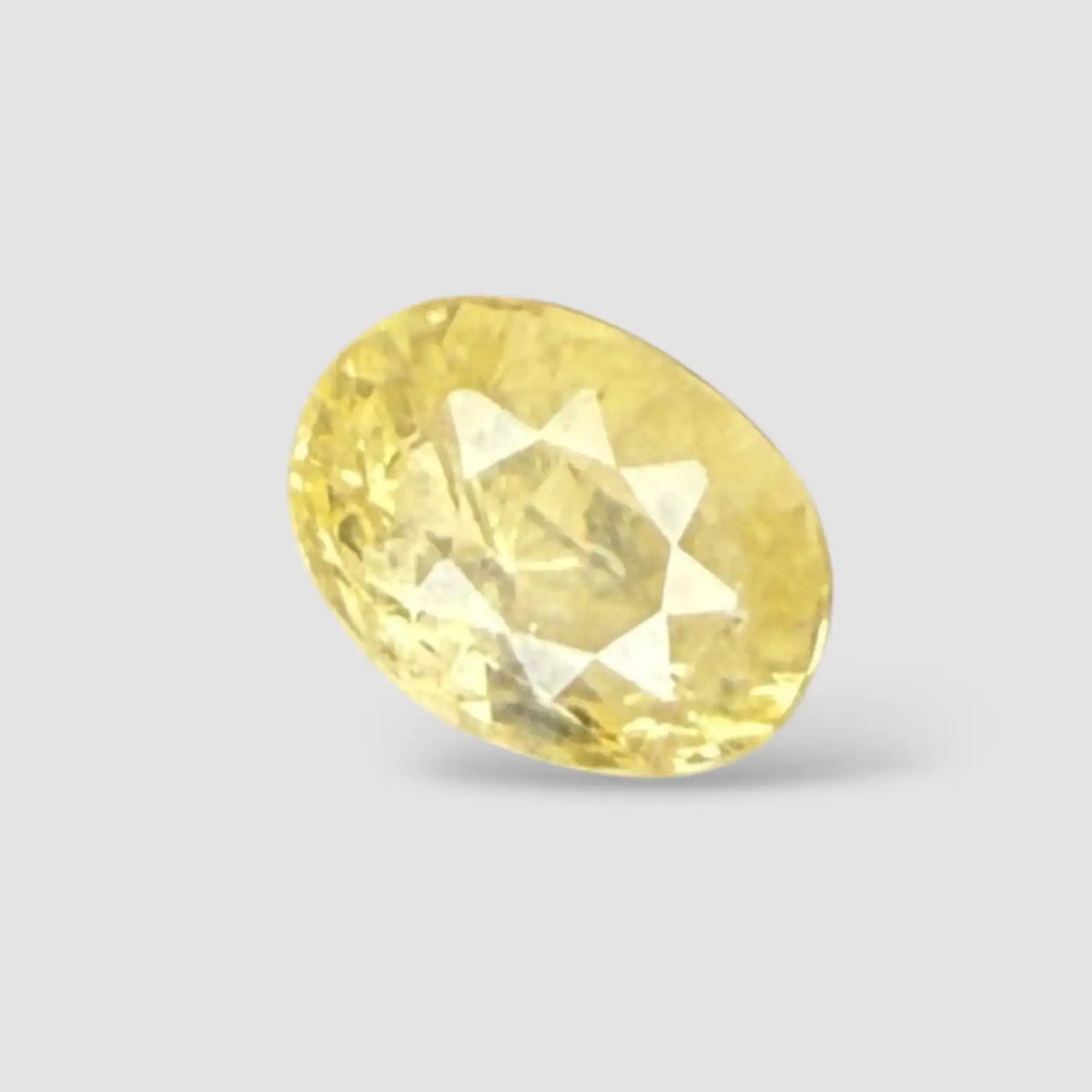 Natural Yellow Sapphire Stone In Oval Shape 5.61 Carats 11.61x8.55x 6.79mm Size
