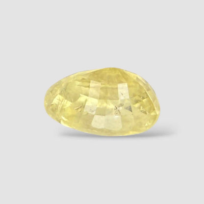 Natural Yellow Sapphire Stone In Oval Shape 5.61 Carats 11.61x8.55x 6.79mm Size